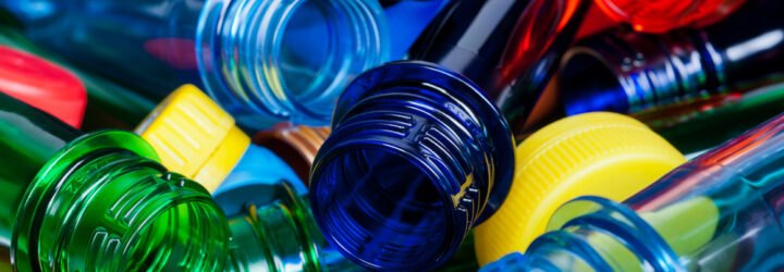 blue, green, red, yellow bottles