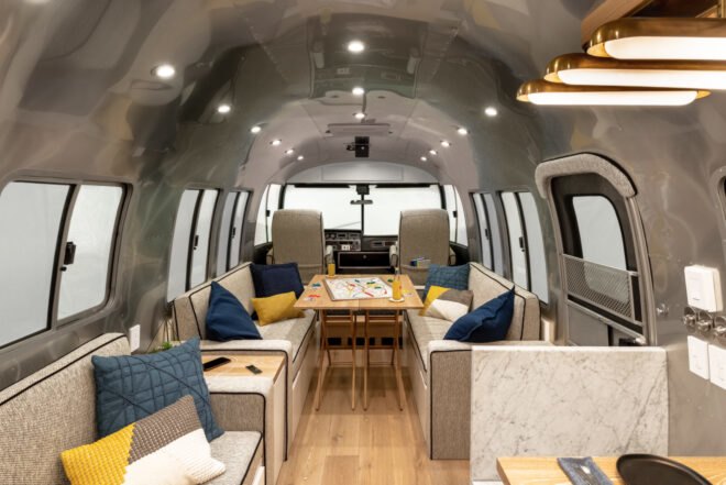 inside an Airstream with three sofas