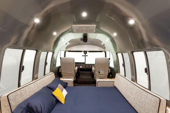 sofas pulled out into a large blue bed