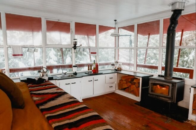 a large living space with glass windows
