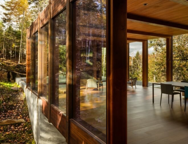house with wood floors and glass walls