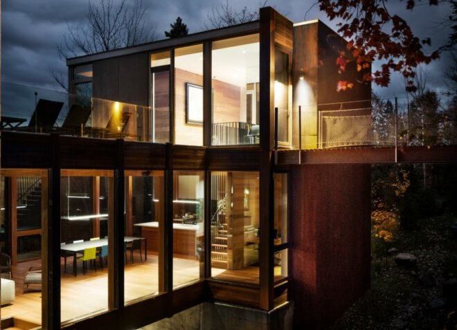 home with multiple levels lit up at night