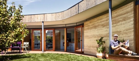 curved home with rammed earth walls