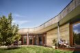 curved home with rammed earth walls
