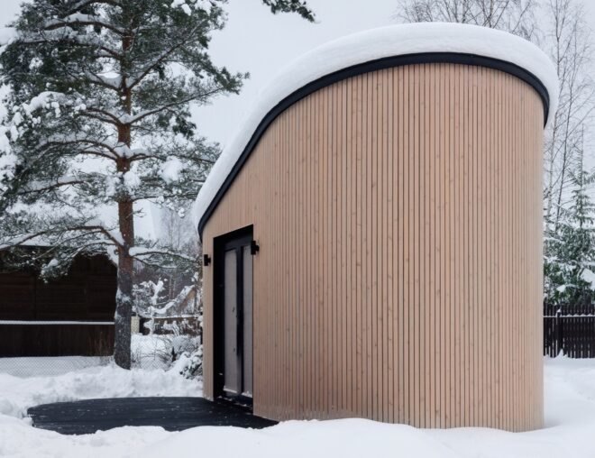 tiny house surrounded by snow
