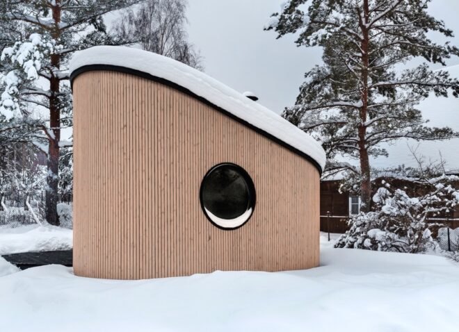 tiny house surrounded by snow