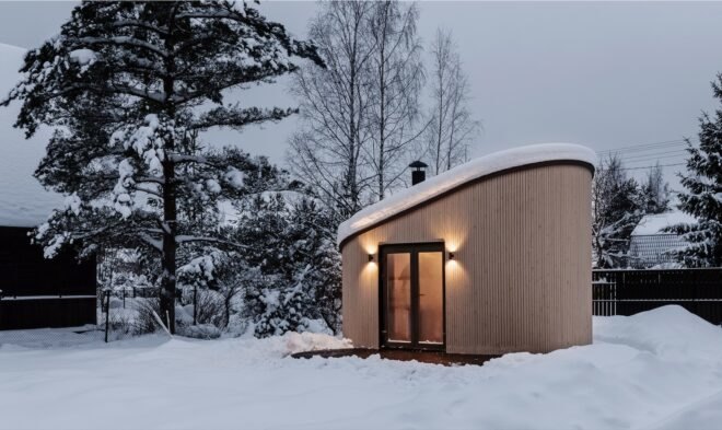 tiny house surrounded by snow