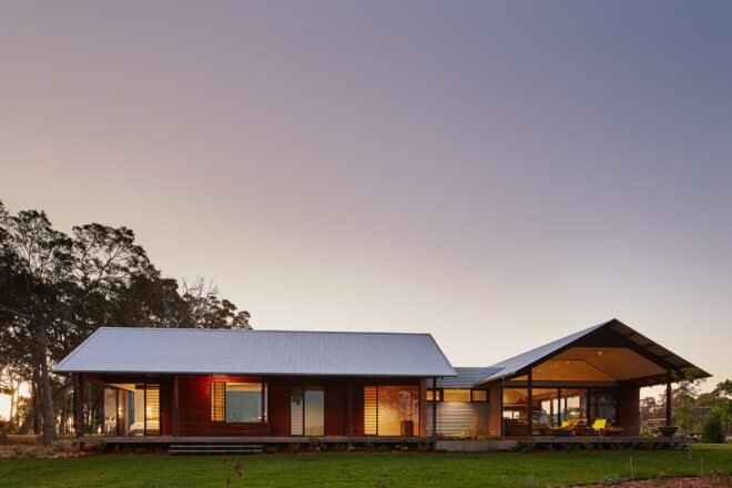 wood farmhouse with gabled roofs