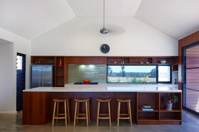 kitchen with dark wood cabinets and white countertops