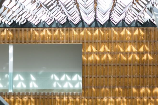 shimmery roof shining on a brown wall