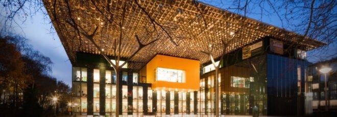 glass building with shimmery roof