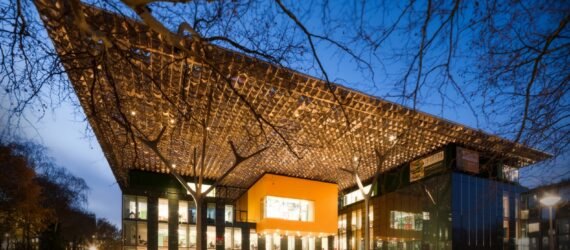 glass building with shimmery roof