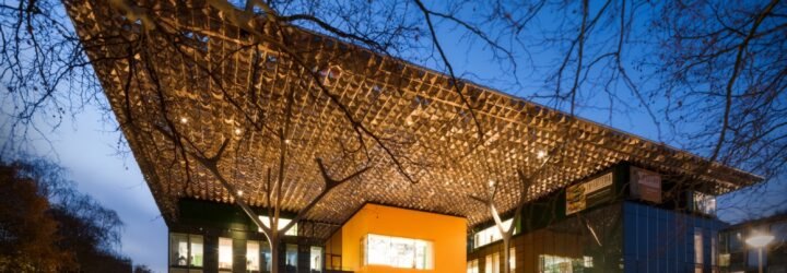 glass building with shimmery roof