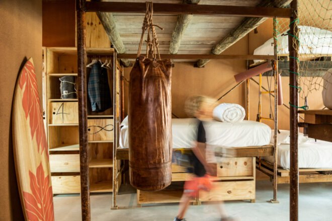 interior of guest room with hanging punching bag