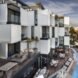 hotel with white and glass blocks on the facade