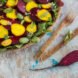 brown biodegradable tableware with colorful salad on plate