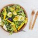 brown biodegradable tableware with colorful salad on plate