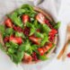 brown biodegradable tableware with colorful salad on plate