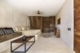 tan bedroom with wooden screens