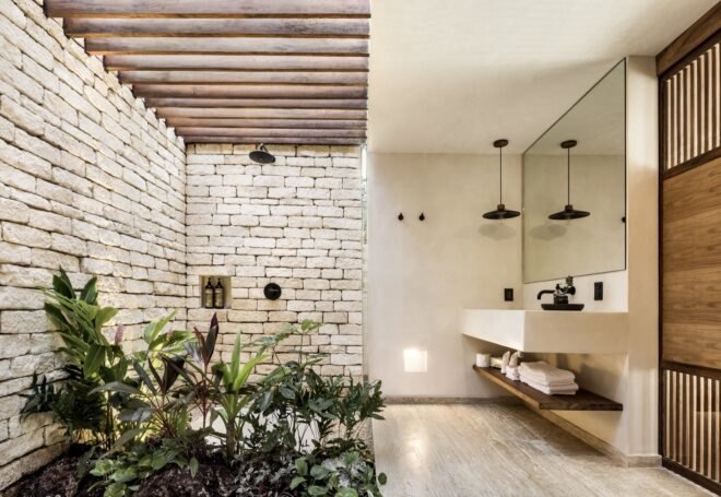 shower enclosed in natural bricks