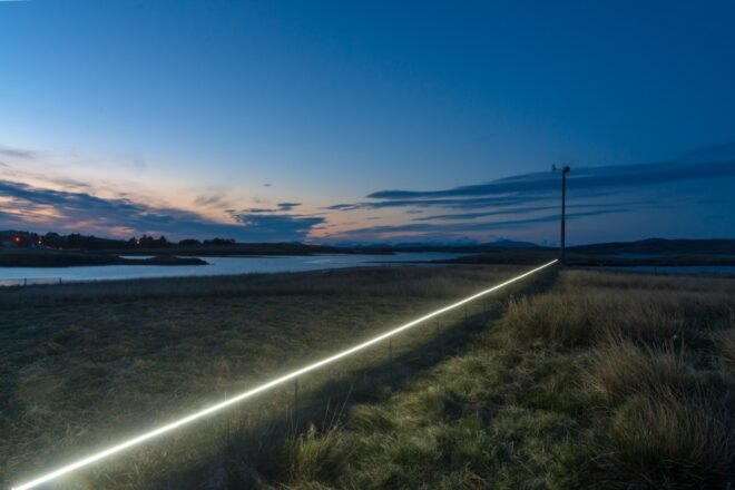 white line on grassy plain
