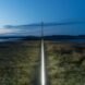 white line in the middle of grassy field