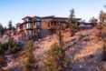 house on hill top over looking scenic landscape