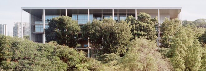 SDE4 building surrounded by large green trees