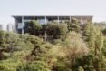 SDE4 building surrounded by large green trees