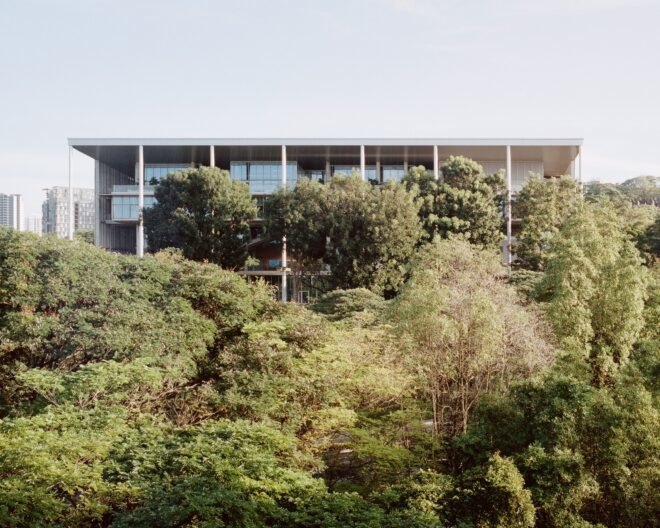 SDE4 building surrounded by large green trees