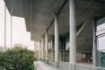 exterior view of the building with pillars and high ceilings