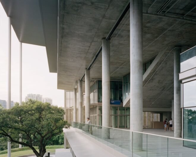 exterior view of the building with pillars and high ceilings