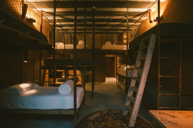 interior of guest room with multiple beds