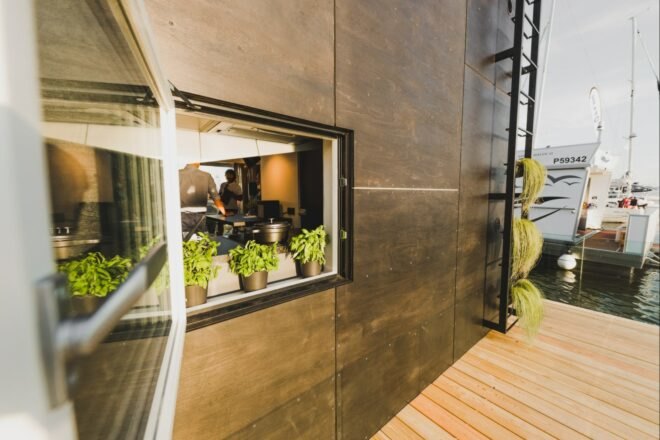 cube-like tiny home with large window