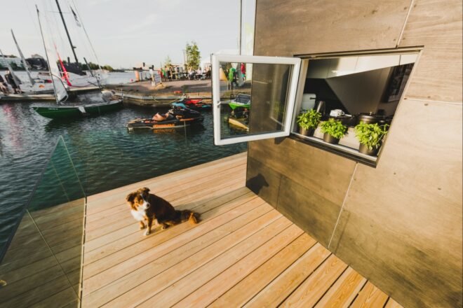 cube-like tiny home set on floating platform
