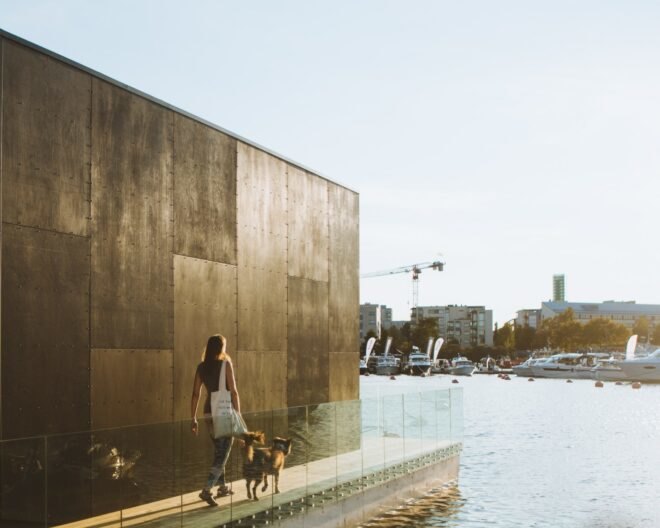 cube-like tiny home set on floating platform