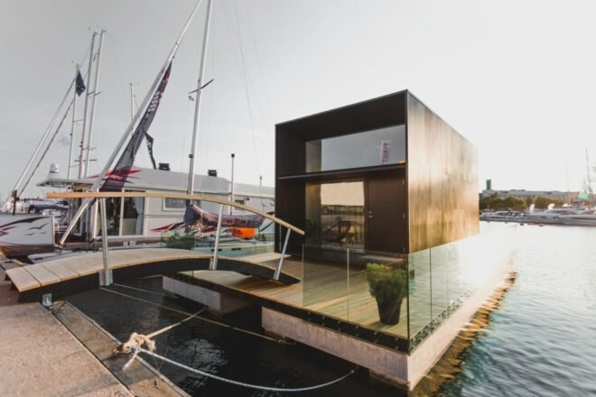 cube-like tiny home set on floating platform