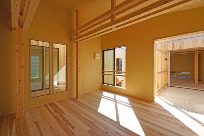 wood-lined room with wood beams