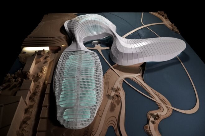 3D model of curvy building on a river