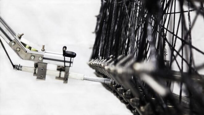 robots building a triangle pavilion