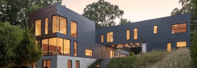 gray home with two perpendicular volumes