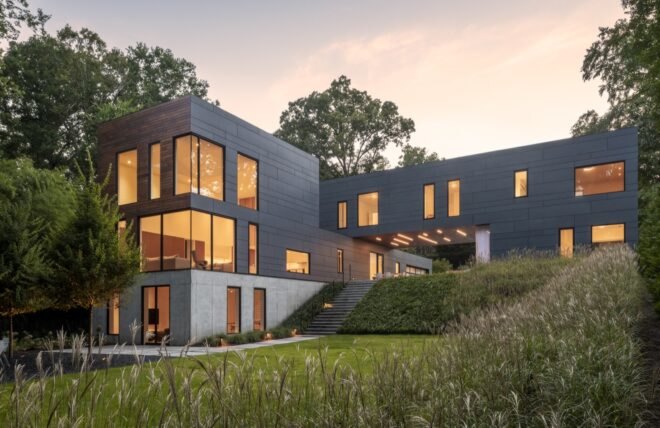 gray home with two perpendicular volumes