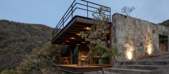 cabin with glass facade and rooftop terrace