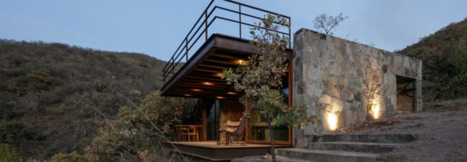 cabin with glass facade and rooftop terrace