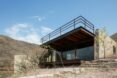 cabin with glass facade and rooftop terrace
