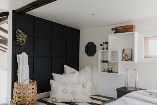 interior living space with a black accent wall