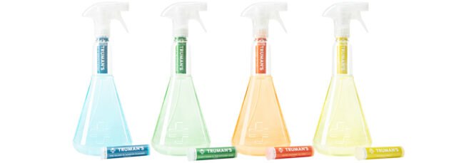 four spray bottles with different colors of cleaning solution cartridge