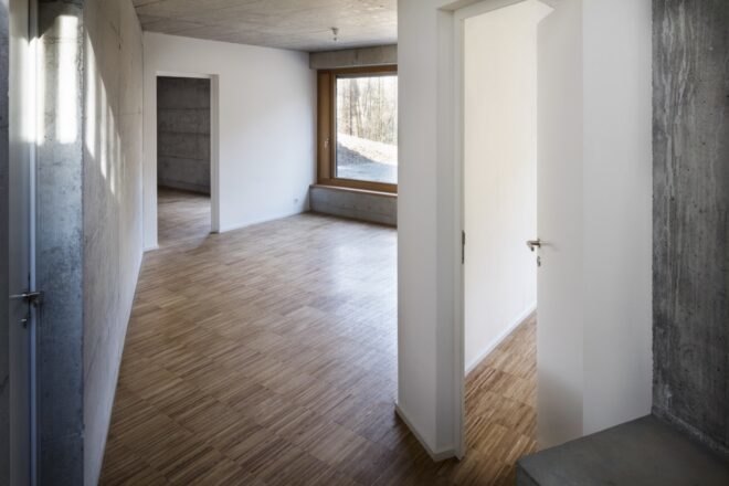 interior of home with white walls and timber floors