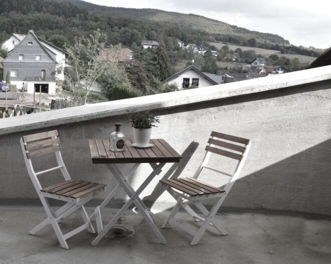 small dining set on outdoor deck
