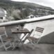 small dining set on outdoor deck
